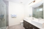 The master bathroom offers walk in shower & double vanity. 
